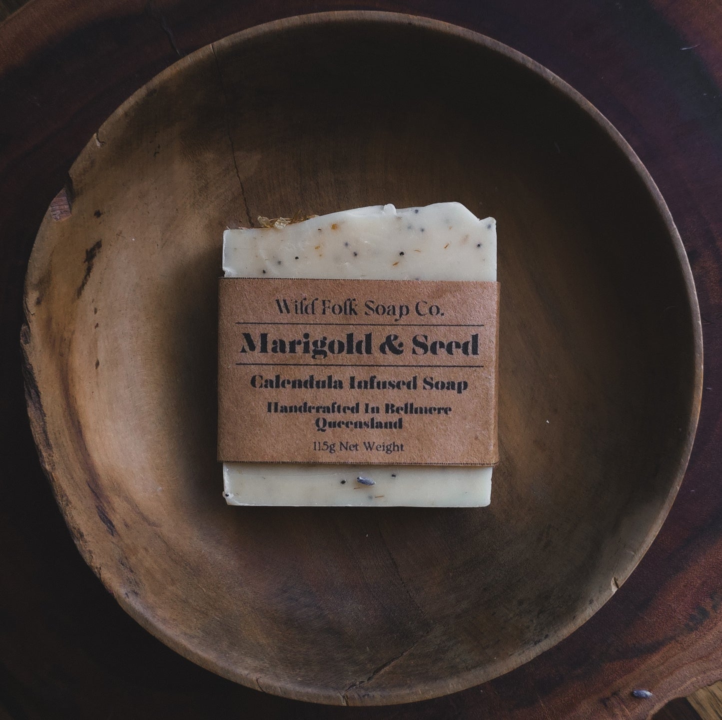 Marigold & Seed handmade cold process calendula soap with calendula-infused olive oil, poppy seeds, kaolin clay and essential oils by Wild Folk Soap Co.