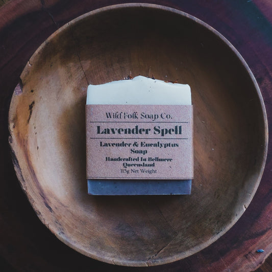 Lavender Spell handmade cold process lavender soap with alkanet root, purple clay, charcoal pencil line, poppy seeds and lavender essential oil by Wild Folk Soap Co.